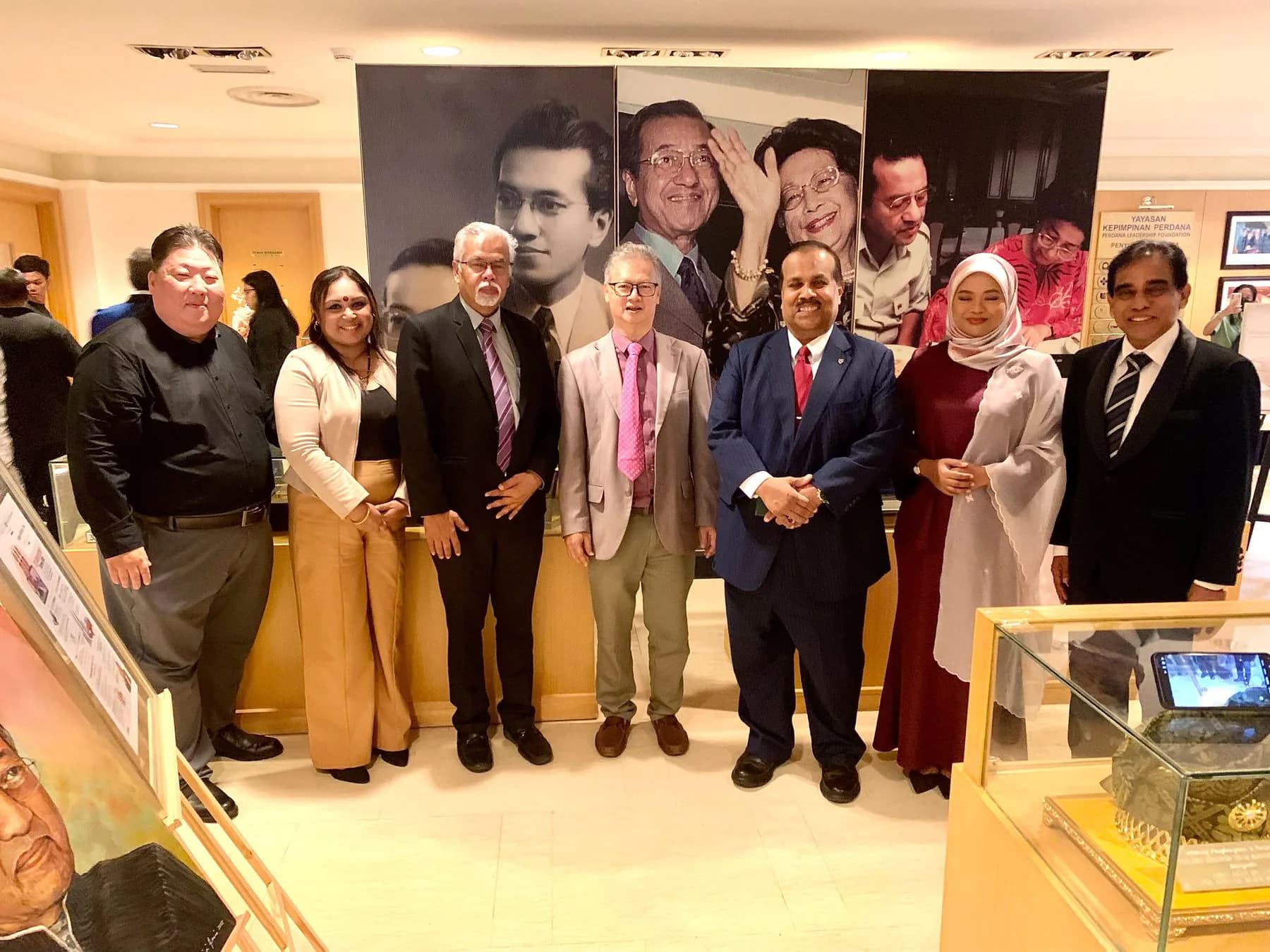Faculty and programme community members at a professional event